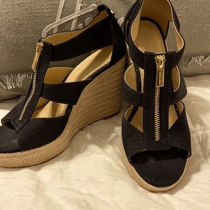 Size 7.5 Michael Kors black canvas, zip front sandal